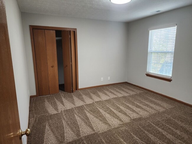 Building Photo - Spacious 2-Bed, 2-Bath Duplex with Attache...