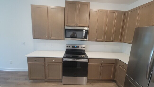 Building Photo - Section 8 Accepted!!! "Discover Comfort and Style: 3-Bed, 2.5-Bath Gem with Granite Elegance in H...