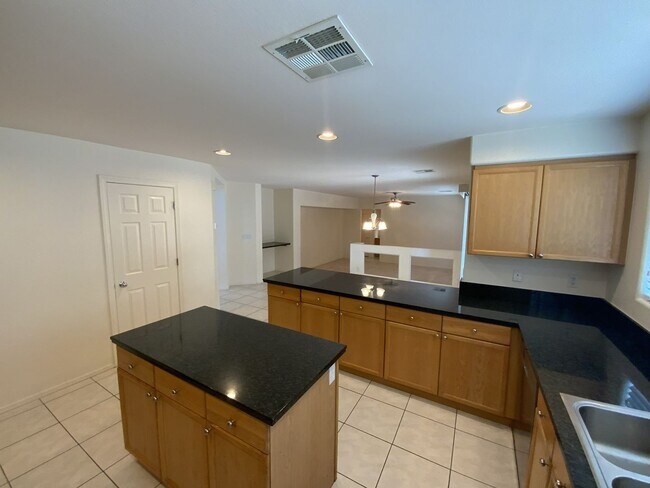 Building Photo - 4 bedrooms and 2.5 bathrooms 2-story home located in Henderson, NV!