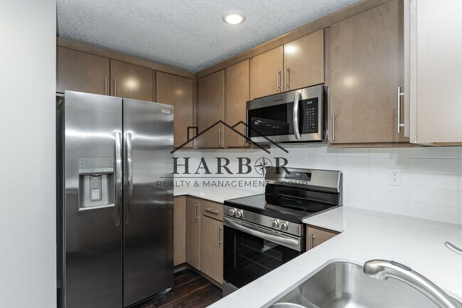 Building Photo - Brand NEW Caroline Apartments 201 -  Move ...