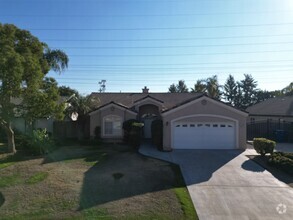 Building Photo - A charming 3-bedroom, 2-bathroom home for ...