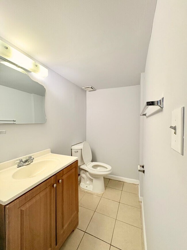 Building Photo - Charming Brick Home with Finished Basement, Modern Kitchen & Spacious Yard