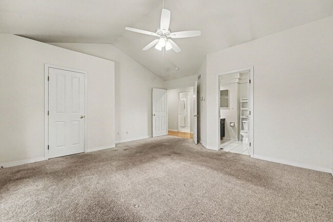 Building Photo - Beautiful 2BR Townhome in Gated Community with 2-Car Garage