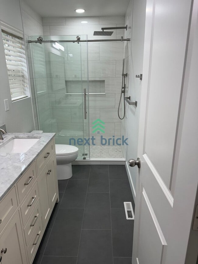 Building Photo - For Rent: 3 Bedroom, 3 Bathroom Home with Den