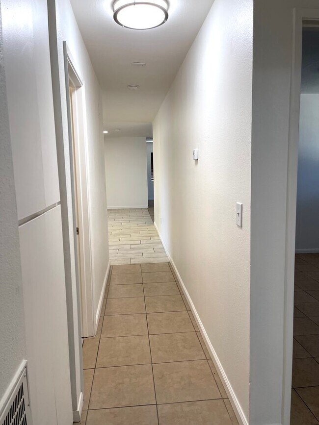 Building Photo - Spacious Four Bedroom Two Bathroom home for lease in San Bernardino, CA $3,175