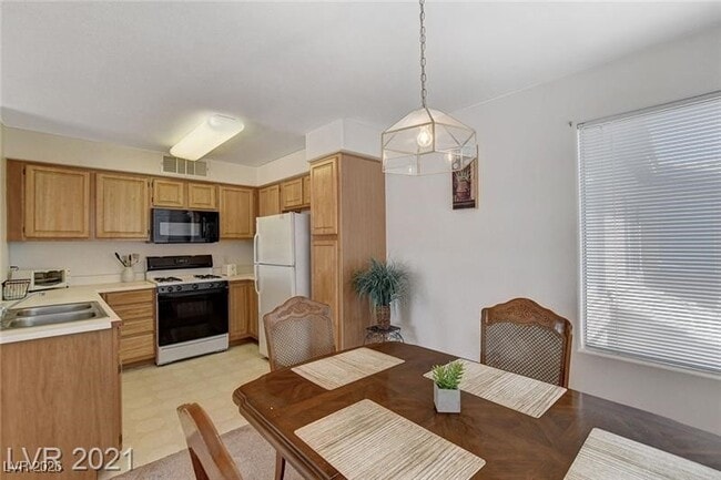 Building Photo - 5710 E Tropicana Ave