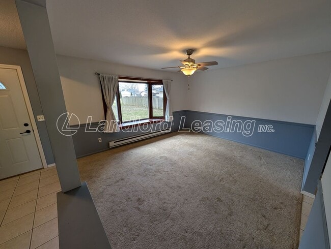 Building Photo - Spacious Elyria Split-Level Near LCCC with Fireplace & Fenced Yard