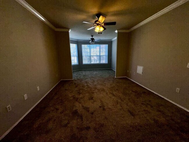 Building Photo - Spacious 2 Bed / 2 Bath Second-Floor Condo at Grand Reserve at Kirkman Park