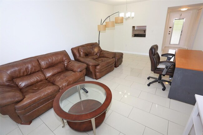 Building Photo - 8225 Sunrise Lakes Blvd