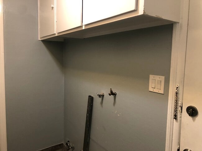 Laundry room - Hook up & storage cabinets - 5727 S Corning Ave