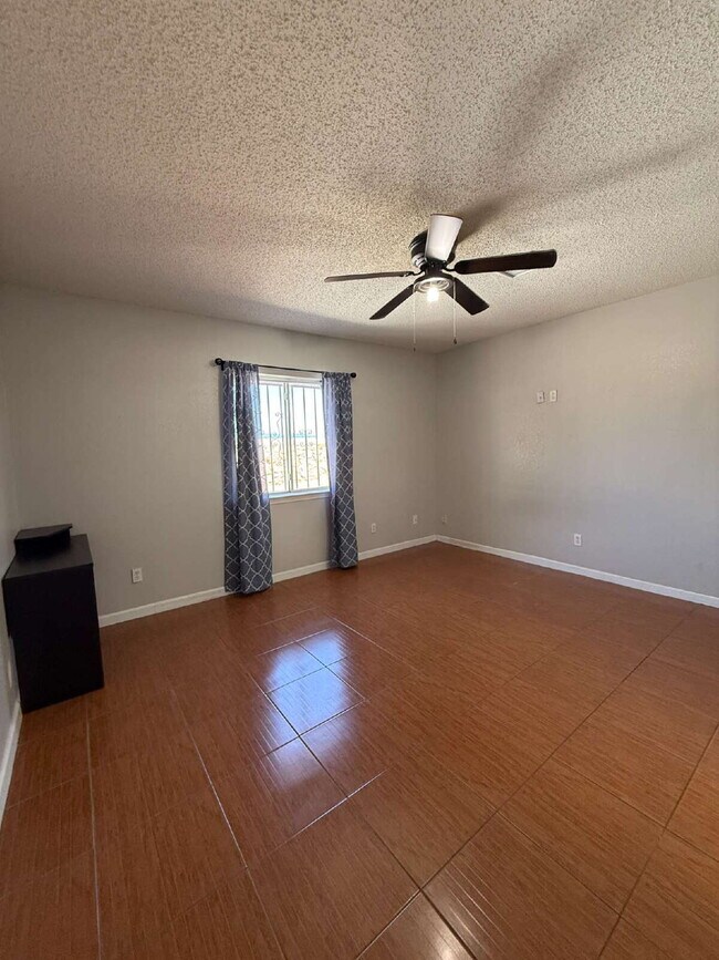 Building Photo - Well, kept three-bedroom, two baths home with Solar Panels. A must see, lease today! 11797 Imperi...