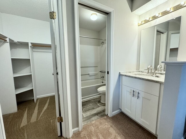 Building Photo - Updated 1st Floor/1-Level Condo Available NOW & Rent Includes Water, Sewer, Trash, Landscaping, F...