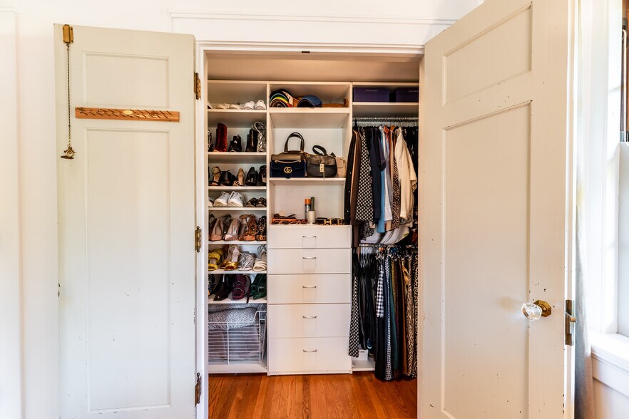 organized walk in closets - 4061 Beechwood Ave