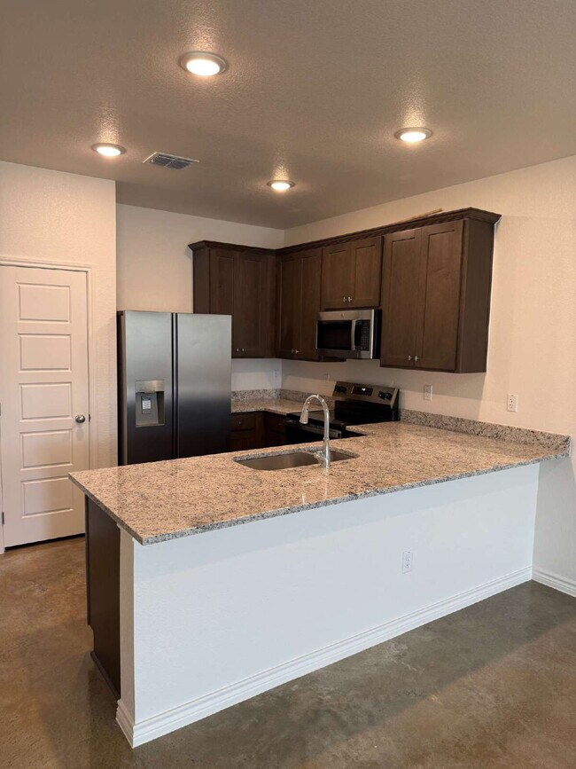 Building Photo - Brand New 3BR Duplex with Modern Concrete Floors & Fenced Yard!
