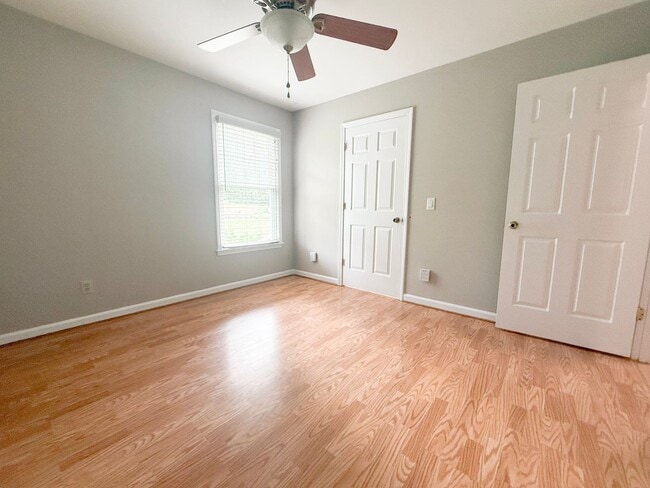 Building Photo - Spacious 3-Bedroom Home with Screened Porch, 2-Car Garage + Workshop