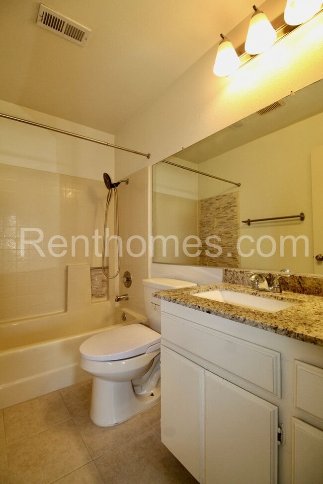 Building Photo - 9362 Twin Trails Dr