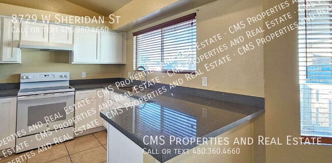 Building Photo - 8729 W Sheridan St