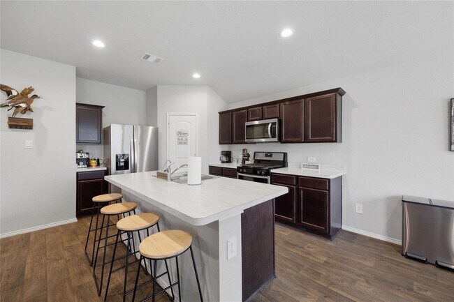 Building Photo - The price is right and the location is even better! Take a look TODAY at this like-new, 3/2, open...