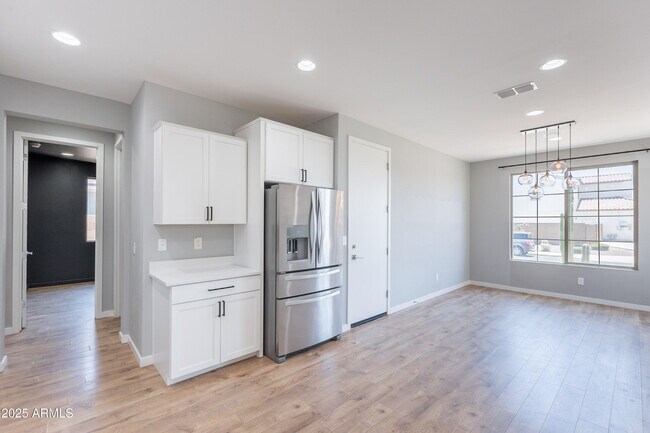 Building Photo - 9570 W Whispering Wind Dr