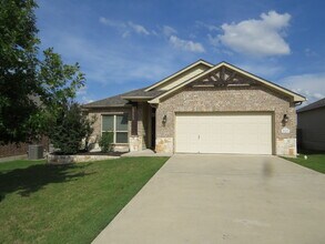 Building Photo - "Charming 4-Bed Oasis with Granite Touches...