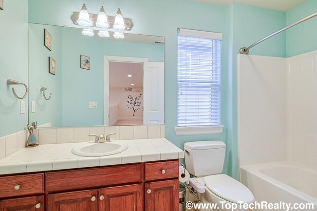 Building Photo - Beautiful 4 Bedroom | 2.5 Bathroom | 2,540 Sqft. Home | Central A/C | Solar Panels | Located in B...