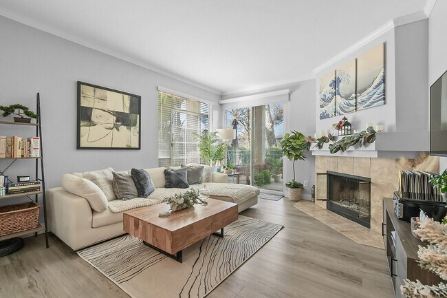 Building Photo - Remodeled River-View Corner Unit with Oversized Patio