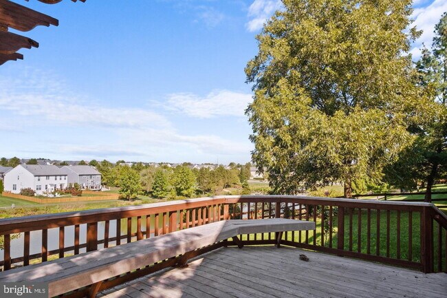 Building Photo - Spacious 4-Bedroom Home with Lake Views & Finished Basement