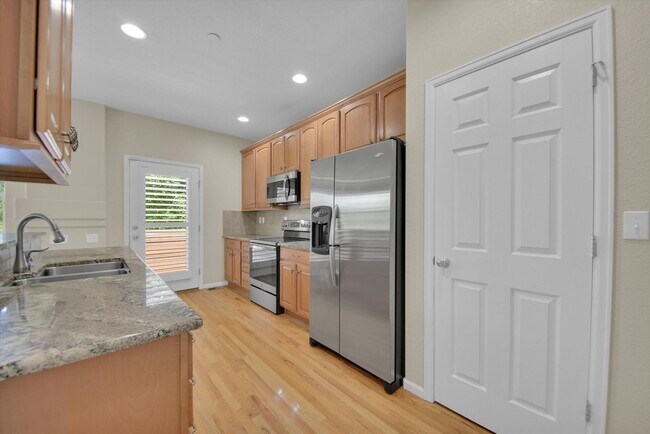 Building Photo - Modern 2-Bed, 3-Bath Home in The Village at Five Parks – Ralston Valley - AVAILABLE SEPTEMBER 1ST!!