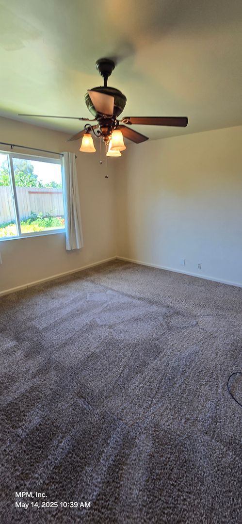 Building Photo - 4 Bedroom 2 bath home with 2 car garage, y...