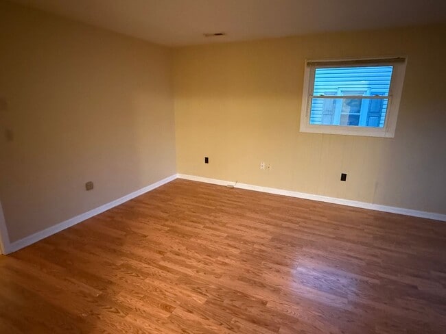 Building Photo - Updated 4BR Home with Finished Basement & Level Yard