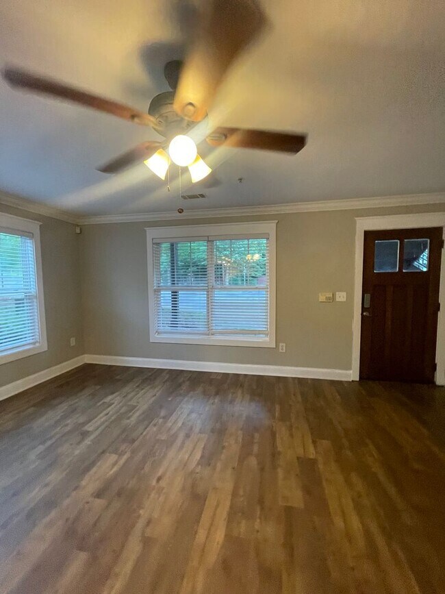 Building Photo - Two Bedrooms Available in this Three Bedroom Flat, Female Applicants!