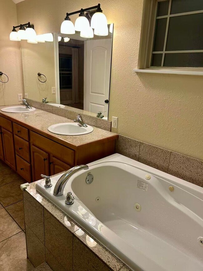 Building Photo - 5 bedroom and 3 bathroom two level house