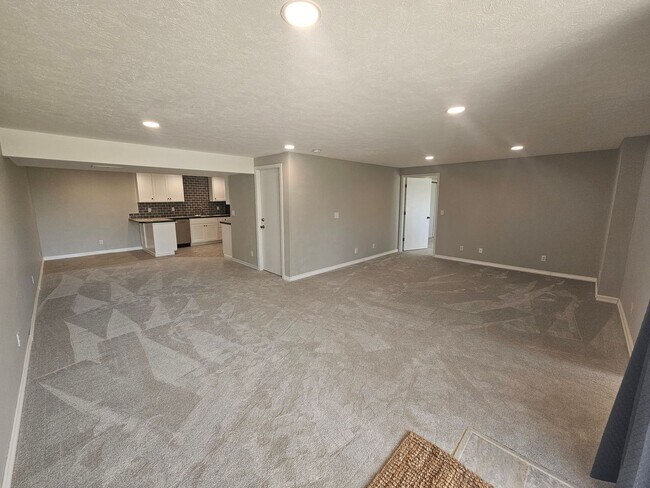Primary Photo - Fully Remodeled Daylight Basement + Utilities!