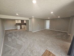Building Photo - Fully Remodeled Daylight Basement + Utilities!