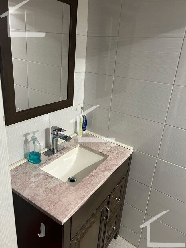 Building Photo - GARDEN LEVEL RENOVATED 2 BED IN ALLSTON!!!