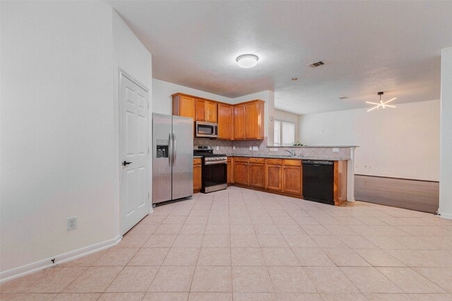 Building Photo - 7434 Jacobs Well Dr