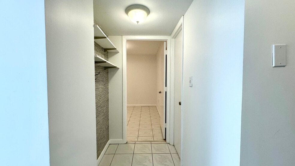 Hallway to Guest Bedroom - 130 S Shore Dr