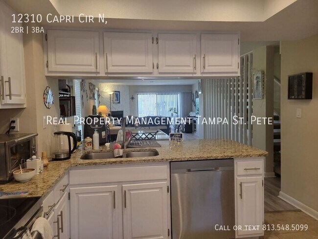 Building Photo - 12310 Capri Cir N