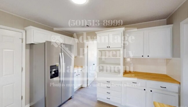 Building Photo - Showings Available!