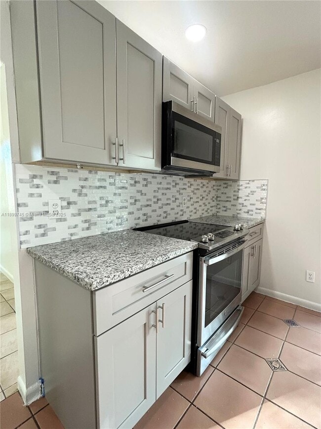 Building Photo - 6452 Royal Palm Beach Blvd