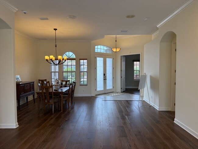 Building Photo - Luxurious 4 Bedroom 3 Bath Lakefront Pool Home W/3-Car Garage