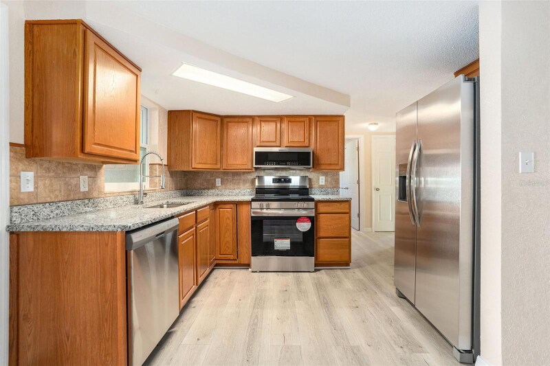 Building Photo - 7321 Parrot Dr