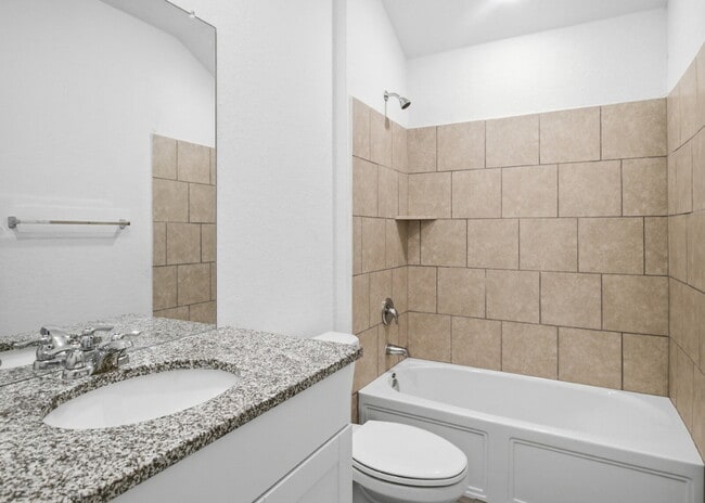 Building Photo - 4 Bedroom Home with Open Layout and Refrigerator Included