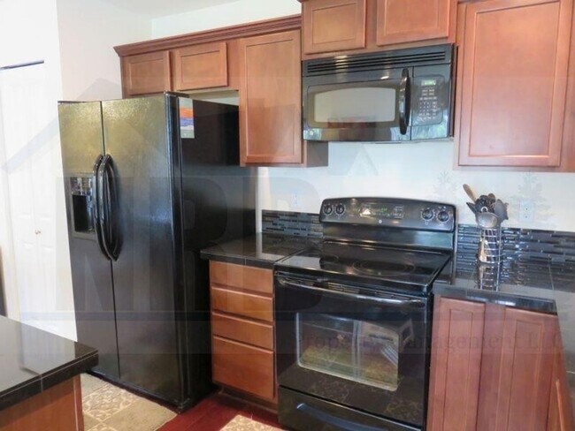Building Photo - Beautiful 4 Bedroom Home located in a Gate...