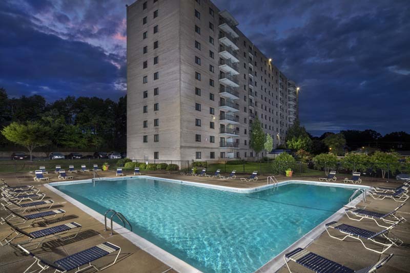 Relaxing swimming pool at Iverson Towers & Anton House Apartments in Temple Hills, MD - Iverson Towers & Anton House Apartments