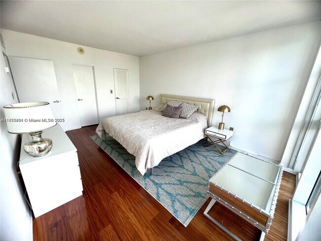 Building Photo - 10275 Collins Ave