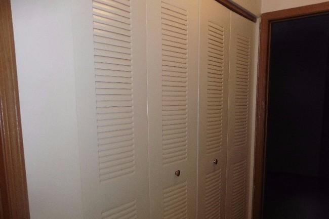 Louvered doors for laundry room - 5685 Chatford Dr