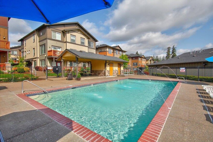 Creekview Crossing Apartments Pool Area and Building Exterior - Creekview Crossing