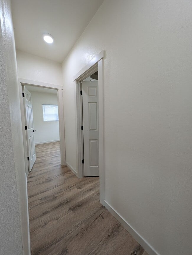 Building Photo - Adorable Four Bedroom w/ Fenced Yard Avail...