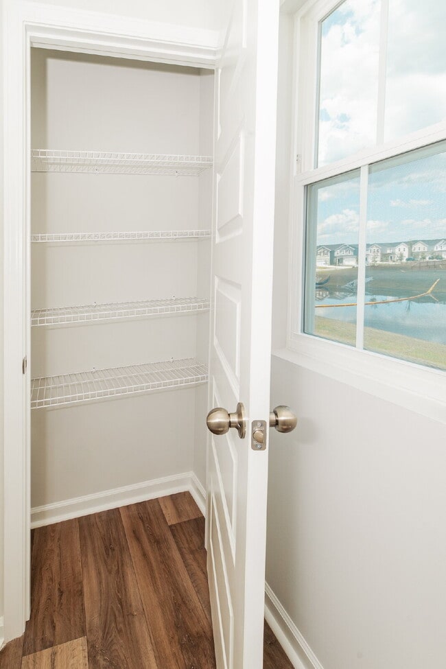 Building Photo - Brand-new 3 bedroom, 2.5 Bath Townhome with pond view